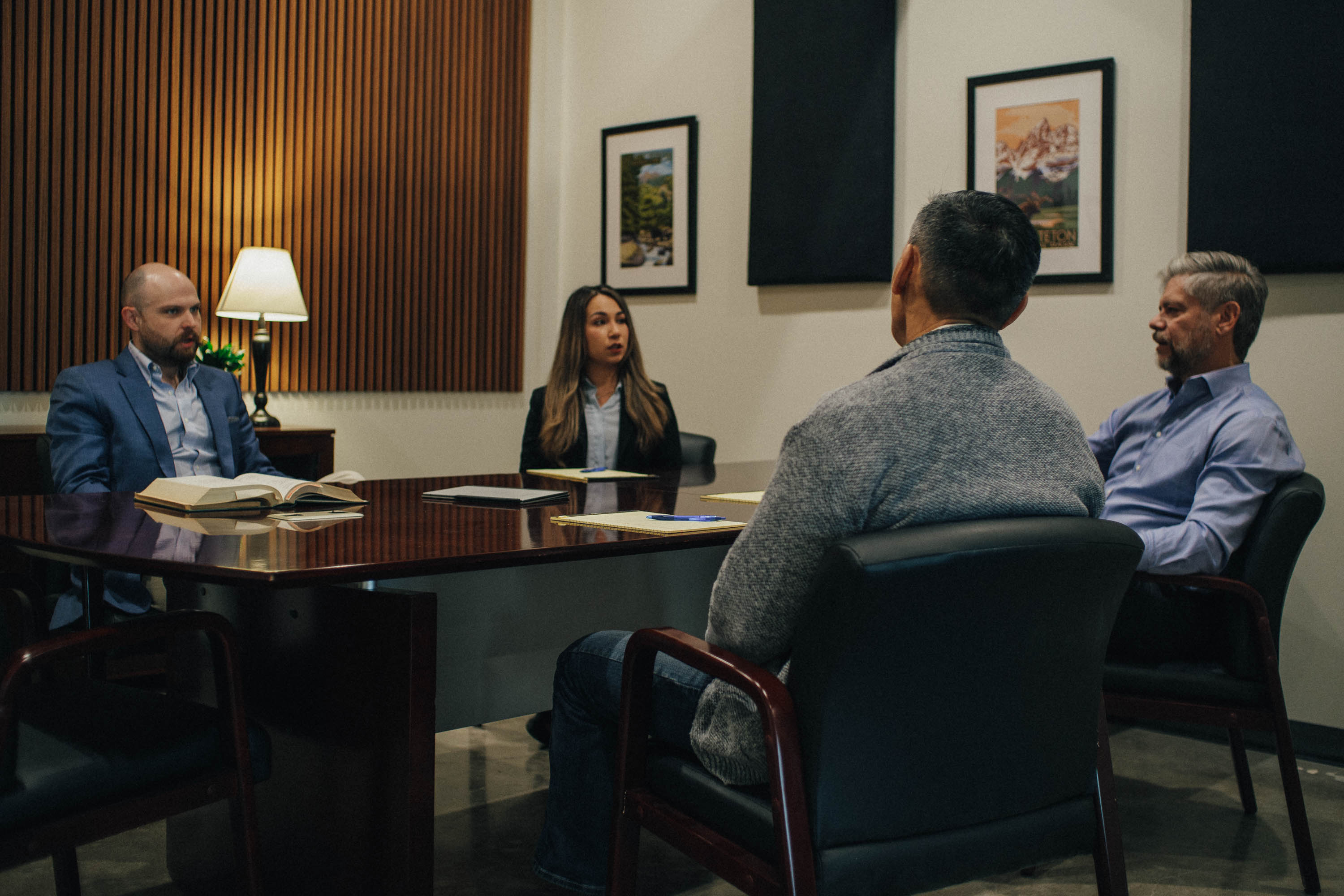 Vames Wang Sosa Hood personal injury attorneys in conference room, Hillsboro Oregon